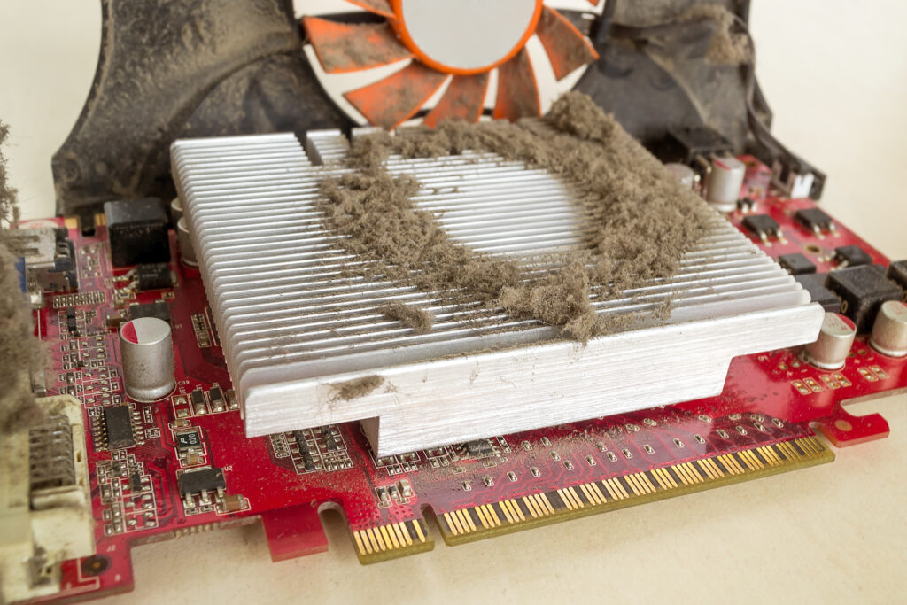An external graphics card with dust on the cooling radiator of the video card processor